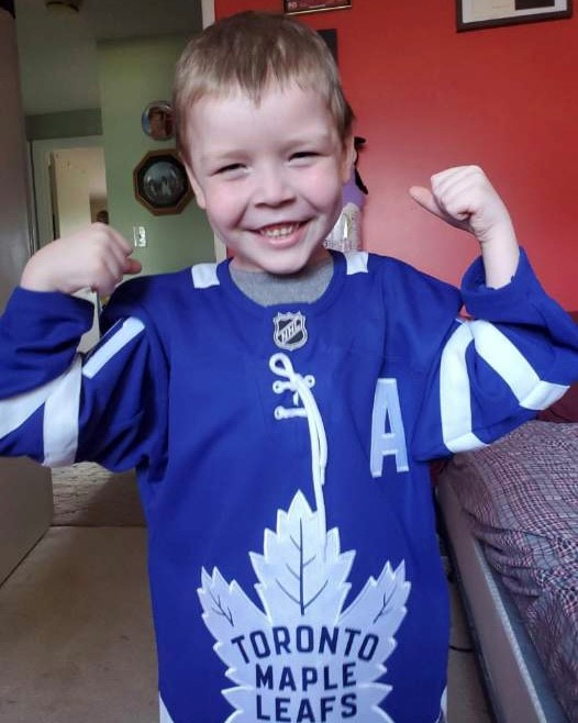 Liam wearing Toronto Maple Leaf Jersey